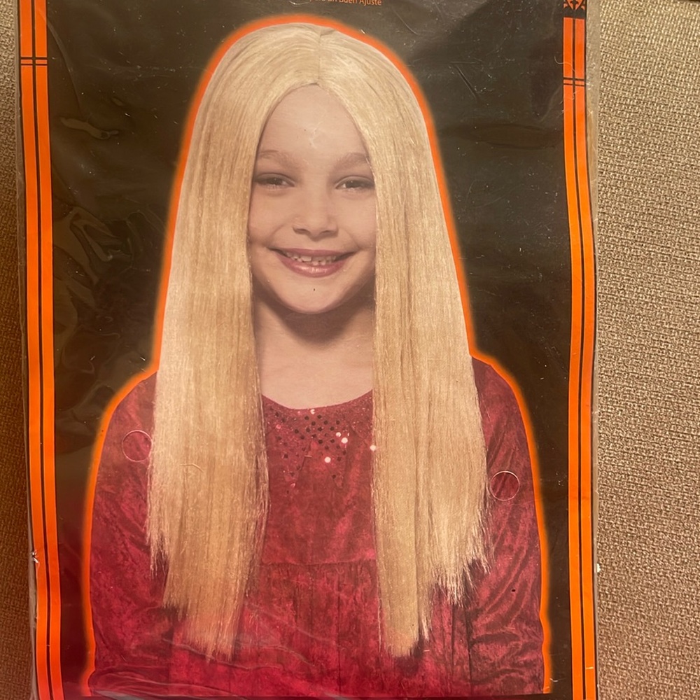 Child’s blonde wig brand new never worn
